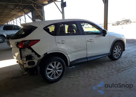 2014 Mazda Cx-5 Touring z USA, uszkodzony, nr VIN JM3KE4CY9E0424343